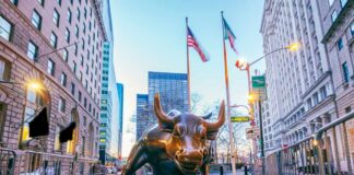 BlackRock CEO Sounds New York Alarm Bronze charging bull sculpture in a city street