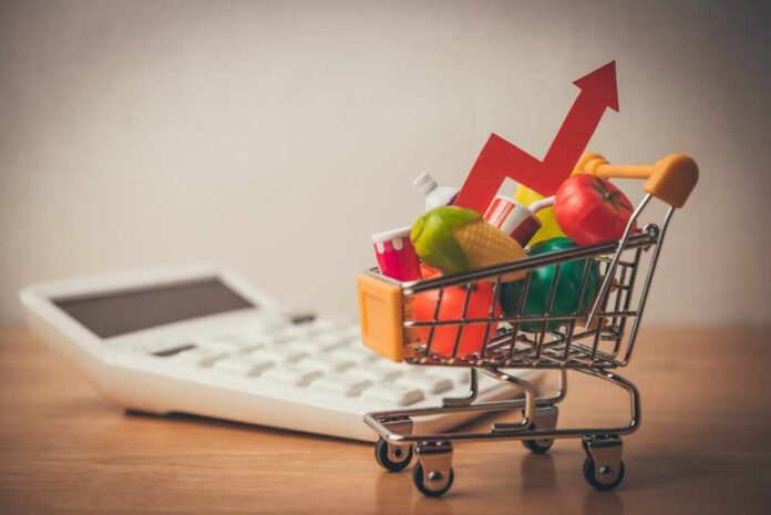 Red,Arrow,Growth,Chart,,Food,,Drinks,,Vegetables,,Fruits,In,Supermarket A shopping cart filled with colorful grocery items next to a calculator and an upward trend arrow
