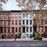 City Blunder Panics NYC Homeowners Row of historic brownstone townhouses with stoops and trees