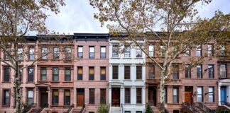 City Blunder Panics NYC Homeowners Row of historic brownstone townhouses with stoops and trees