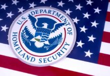 U.S. Department of Homeland Security seal on American flag