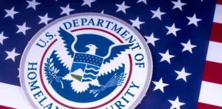 U.S. Department of Homeland Security seal on American flag