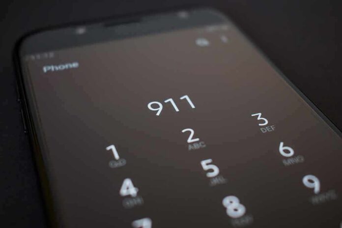 shutterstock_1674917470 smartphone dialer showing 911
