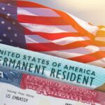 Asylum Move Triggers Historic Visa Crackdown U.S. flag with visa and permanent resident cards