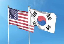 Command Tug-of-War Rattles U.S.–Korea Ties United States and South Korea flags waving against a clear blue sky