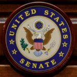 DSA’s Power Play: Erase The Senate United States Senate seal on a wooden wall