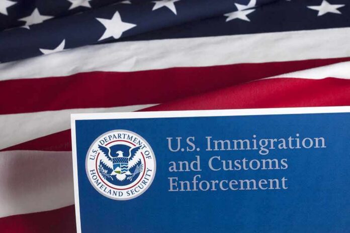 shutterstock_300476915 U.S. ICE document against American flag