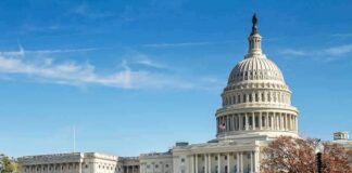 Capitol Brawl Brewing Over Impeachment United States Capitol building with dome and autumn trees
