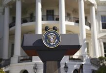 Viewpoint Purge at White House? Presidential podium with seal in front of white-columned building