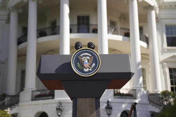 shutterstock_106049342 Presidential podium with seal in front of white-columned building