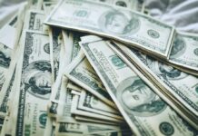 Costly ‘Debt’ Debate Explodes In D.C. Stacks of U.S. hundred-dollar bills