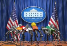 Press Ban Triggers 24/7 Trump Channel Press microphones at a White House briefing podium
