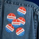 Election Fraud STING Hits California denim jacket with multiple red white and blue voting stickers