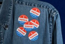 Election Fraud STING Hits California denim jacket with multiple red white and blue voting stickers