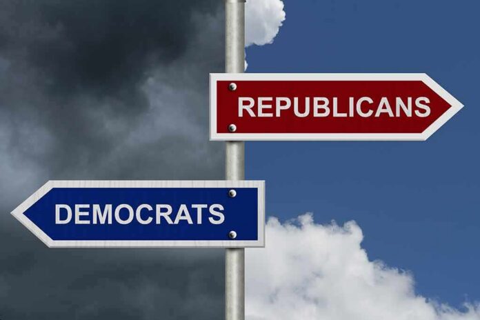 Directional signs for two political parties on a pole