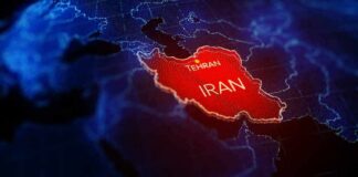 9/11 Remembrance Turns To Iran War Iran highlighted on a digital map