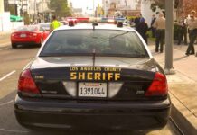 Sheriff patrol car parked on city street