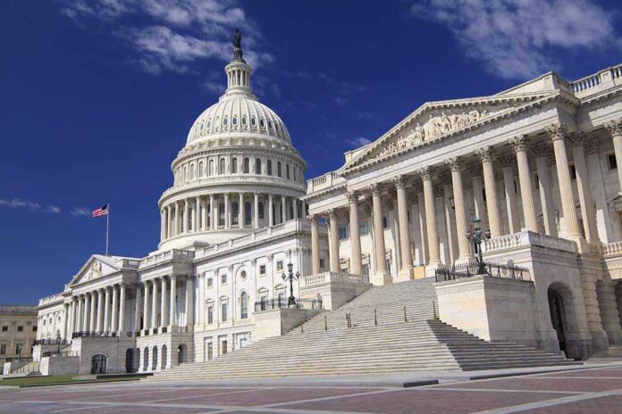The,Eastern,Facade,Of,The,Us,Capitol,Building,,Washington,Dc The U.S. Capitol building with its dome and columns under a blue sky
