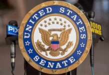 Last-Minute Flip Splits Democrats Wide Open United States Senate seal at a podium