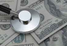 Stethoscope on US dollar bills