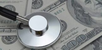 Mass Purge Hits Obamacare – Who’s Next? Stethoscope on US dollar bills