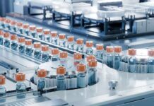 Taxpayer Cash Infects Baboons Pharmaceutical vials on an automated production line
