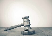 UVU Under Fire After Rooftop Kill Wooden judge's gavel on sound block