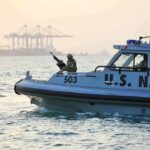 Deadly Strike Forces A Bigger Question U.S. Navy patrol boat with armed crew on the water