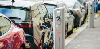 Trump Torpedoes Biden’s EV Plan Electric cars charging at curbside stations