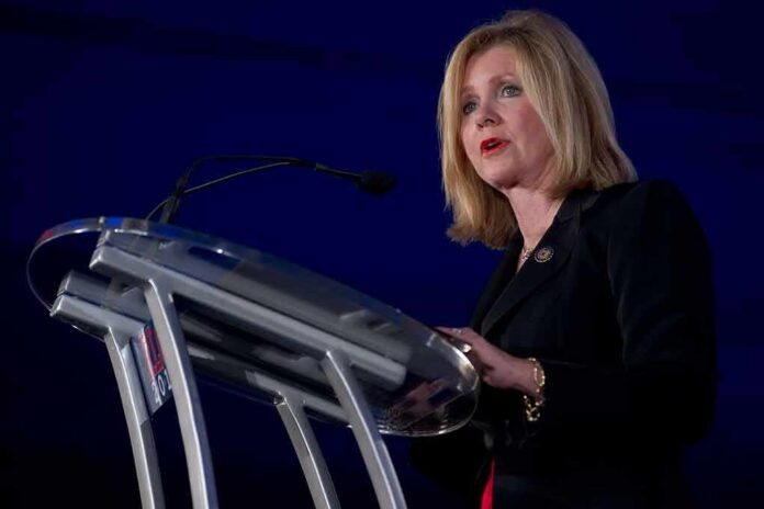 shutterstock_79533325 Marsha Blackburn speaking at a podium with a microphone