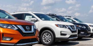 Festival Parking Turns Into Ransom Run Row of Nissan SUVs parked at a car dealership