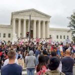 Kid Rock Makes A Bold Claim About America David Givens at a large protest outside a neoclassical courthouse