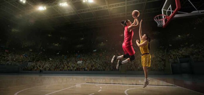 shutterstock_1411326926 Two women playing basketball; Michelle Jenneke is not visible