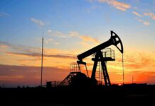 From Pipeline Opponent To Pipeline Advocate? Oil pumpjack silhouette at sunset