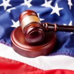 Senator Files Bar Complaint Over Subpoenas Judge’s gavel on a wooden block over the American flag