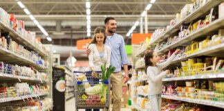 Family shopping in a grocery store aisle